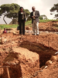 Prof. Yanful and Faith Mwangi touring excavation for water supply at Mathare outside Nairobi, Kenya 2009