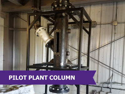 This is a pilot plant system manufactured for an industrial partner. It allows for the studying of process and particle flow in the system. The information collected is used to design and modify much larger full scale reactor system.