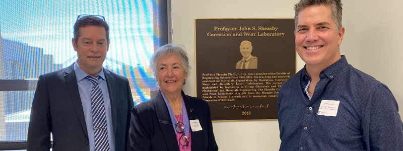 Professor Anthony Straatman stands with Marjorie Sheasby and her son, Michael.