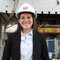 Female student in a hard hat